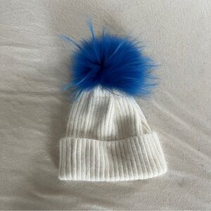 Linda Richards White Hat with Blue Pom Pom